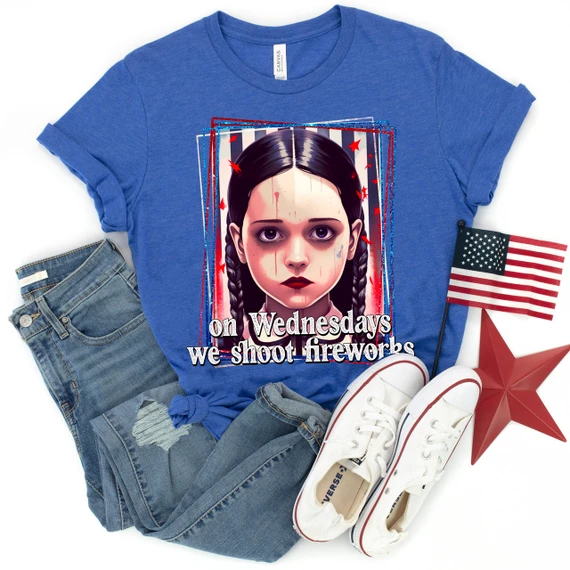 On Wednesdays We Shoot Fireworks DTF Heat Transfer T-Shirt design featuring a girl's face with dark hair in braids, and the text 'on Wednesdays we shoot fireworks' on a blue t-shirt, surrounded by patriotic American flags, sneakers, and patriotic decorations.