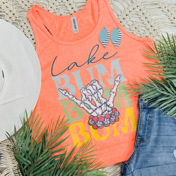 Lake Bum Stacked Screen Print Heat Transfer, a vibrant coral tank top with a graphic of a skeleton hand making the rock on gesture, surrounded by the phrase 'Lake Bum' in colorful text, perfect for summer and beach wear.