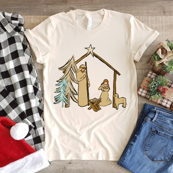 Nativity Scene Screen Print Heat Transfer, Christmas nativity scene with baby Jesus, Mary, Joseph, and animals, on a white T-shirt ready for printing.
