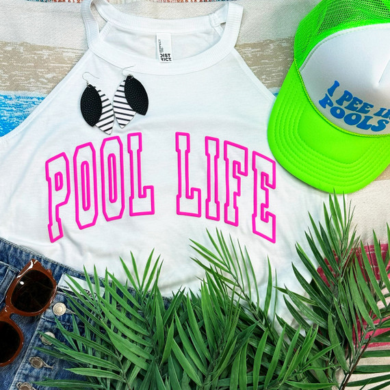 Pool Life Pink PUFF Screen Print Heat Transfer, close-up of a white shirt withbright pink text, part of a summer casual outfit with accessories and a green cap.