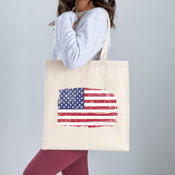 USA Flag Distressed DTF Heat Transfer, design printed on a tote bag.