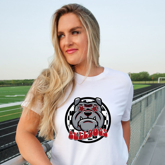 Bulldogs Mascot DTF Heat Transfer, image of a woman wearing a t-shirt with a bulldog mascot design featuring sunglasses and the word 'BULLDOGS' underneath.