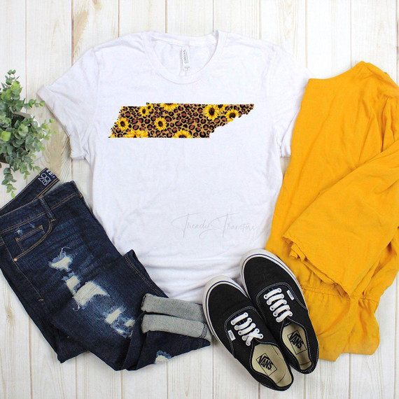 Tennessee Leopard and Sunflower Sublimation Transfer, design of the state of Tennessee with leopard print and sunflower pattern on a white T-shirt.