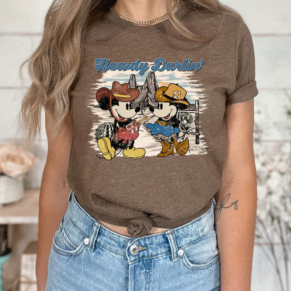 Hello Darlin' MM Western DTF Heat Transfer, Disney's Mickey Mouse and Minnie Mouse dressed in cowboy outfits with a western landscape background.