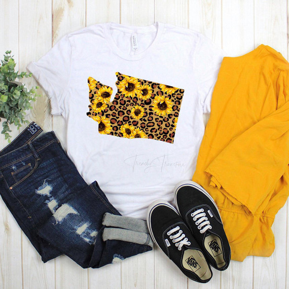 Washington Leopard Sunflower Sublimation Transfer, sunflower and leopard print design on a t-shirt with jeans, yellow jacket, and Vans sneakers.