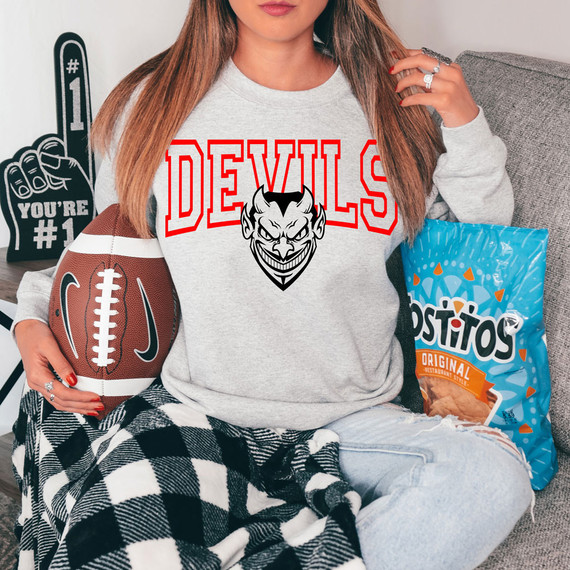 Devils Mascot Custom Color Options DTF Heat Transfer, close-up of a woman wearing a sweatshirt with a devil mascot and red lettering.