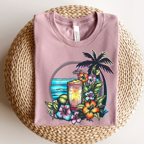 Tropical Drinks DTF Heat Transfer, vibrant colorful tropical beach scene on pink T-shirt featuring a cocktail, palm trees, ocean, and hibiscus flowers.