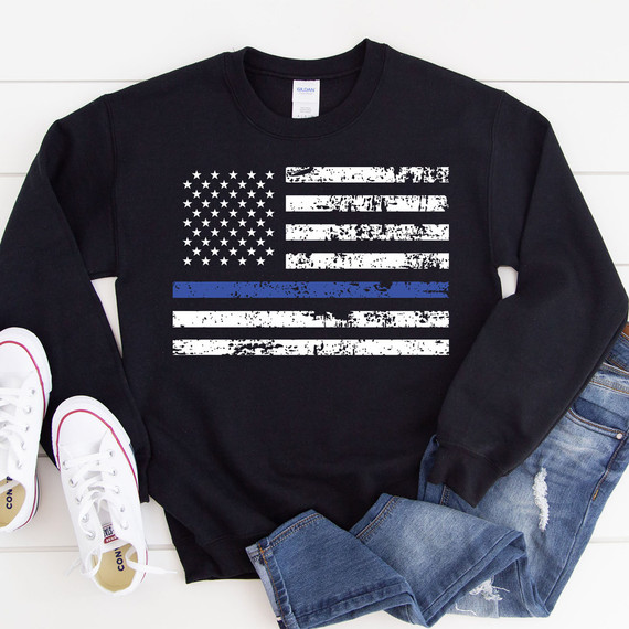 Thin Blue Line Flag DTF Heat Transfer, black sweatshirt with a distressed white and blue American flag design.