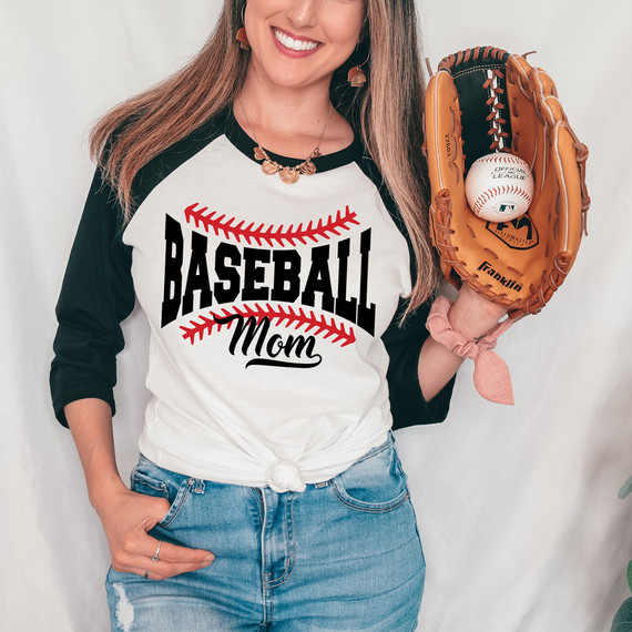 Baseball Mom BLACK DTF Heat Transfer, woman wearing a baseball-themed shirt with a baseball glove and ball.