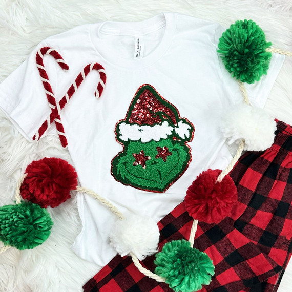 YOUTH Grouchy Green Guy Chenille Patch, festive holiday-themed patch with a mischievous green character wearing a Christmas hat and star-shaped decorations.