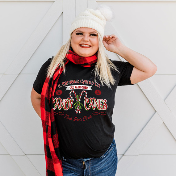 Old Fashioned Candy Canes DTF Heat Transfer, colorful Christmas-themed graphic design on a black t-shirt.