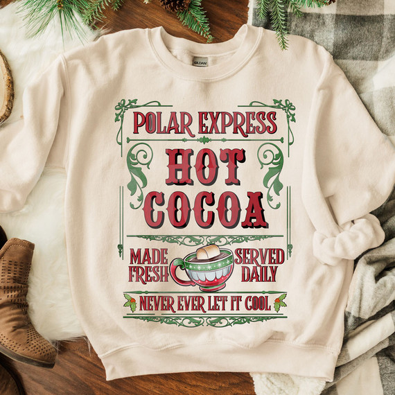 Hot Cocoa Train DTF Heat Transfer, graphic sweatshirt with holiday-themed design for hot cocoa lovers