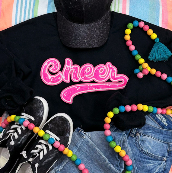 Pink Cheer Sequin Patch, a vibrant pink sequin applique with a fun, glittery design for embellishing clothing and accessories.