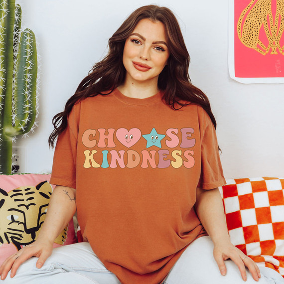 Choose Kindness Retro DTF Heat Transfer, colorful graphic design with hearts and stars on a woman's T-shirt.