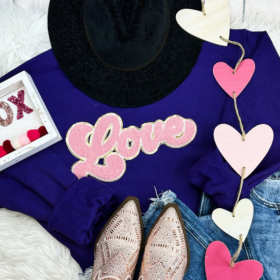 LIGHT PINK LOVE Chenille Patch, pink and glittery embroidered love patch on purple sweatshirt with other fashion accessories.