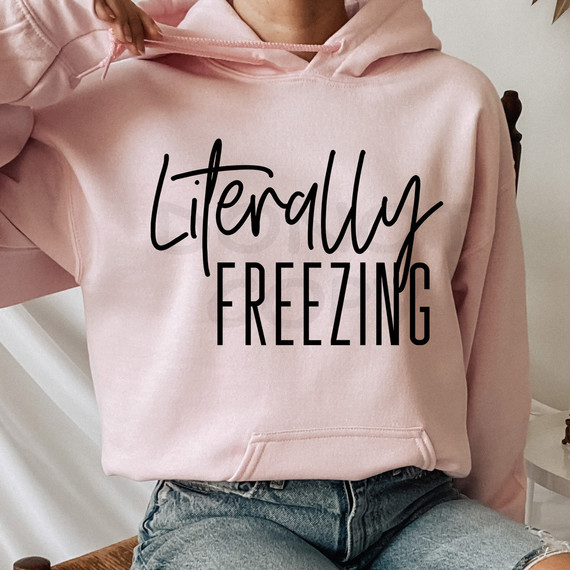 Literally Freezing DTF Heat Transfer, pink hoodie with black text design.
