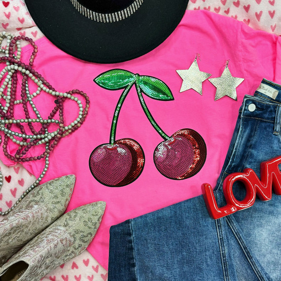 Cherries Sequin Patch, vibrant pink fabric with green leaves and red cherry design made of sequins.