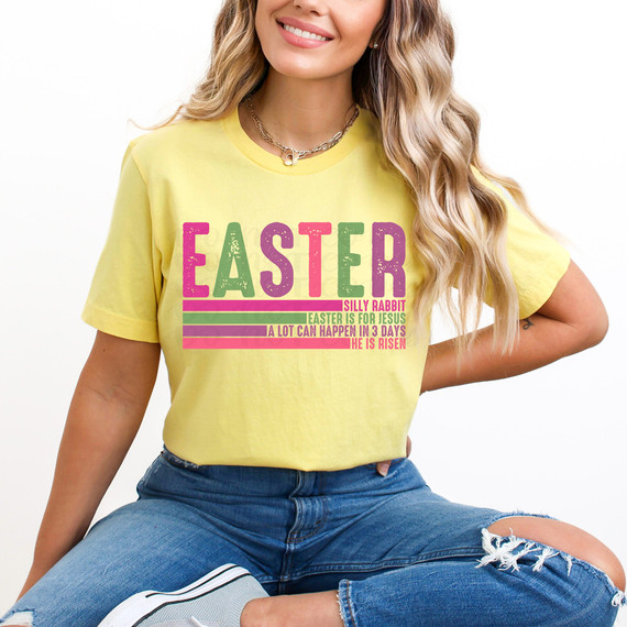 Easter Is For Jesus DTF Heat Transfer, colorful and vibrant design on a yellow t-shirt featuring Easter-themed text and graphics.