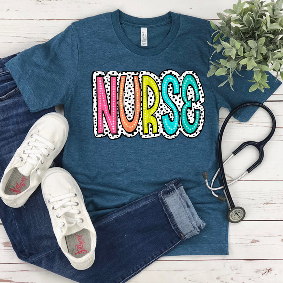 Nurse Dalmatian Dots DTF Heat Transfer, colorful and playful design on a blue T-shirt with black and white dotted pattern.