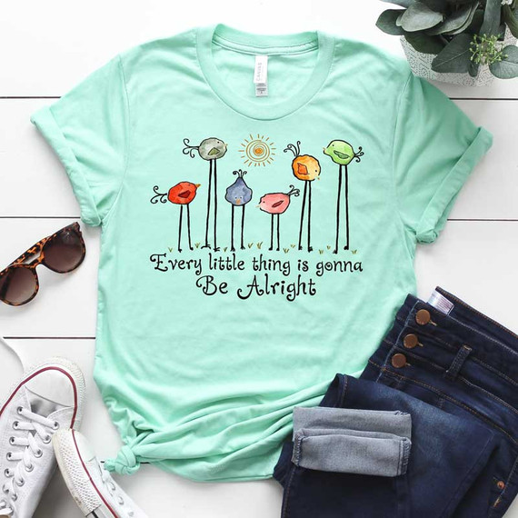 Every Little Thing Is Going To Be Alright DTF Heat Transfer, light green T-shirt with colorful whimsical flower design and motivational quote.