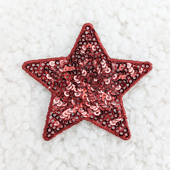 RED sequin STAR HAT/POCKET Patch, a red star-shaped patch decorated with shiny sequins and a fabric border on a white textured background.