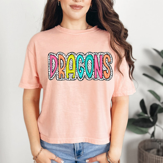 Dragons Dalmatian Dots DTF Heat Transfer, colorful and playful heat transfer design on a pink t-shirt.