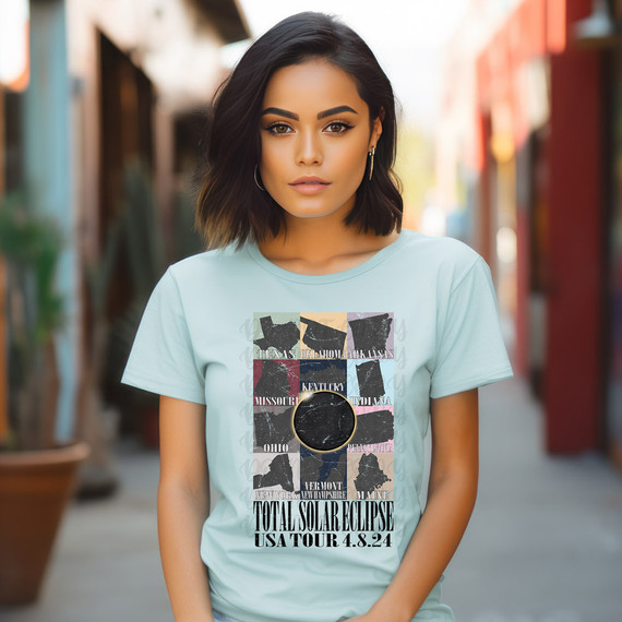 Total Solar Eclipse USA Tour DTF Heat Transfer, woman wearing a t-shirt with a graphic design of U.S. states and eclipse event details.