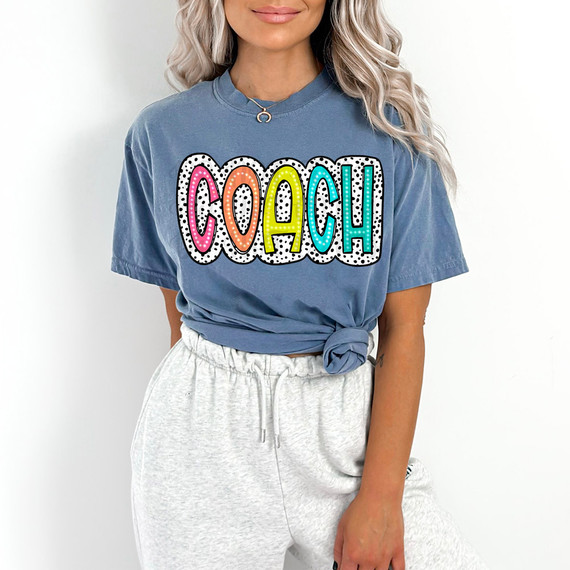 Coach Dalmatian Dots DTF Heat Transfer, colorful and playful polka dot design on a blue t-shirt.