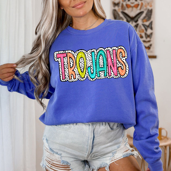 Trojans Dalmatian Dots DTF Heat Transfer, colorful polka dot design on a blue sweatshirt.