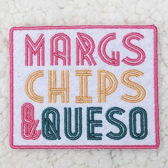 Margs Chips & Queso Embroidered HAT/POCKET Patch, colorful embroidered patch featuring the text "MARGS CHIPS & QUESO" in pink, yellow, and teal thread on a white background.