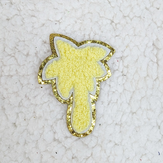 Yellow Palm Tree Chenille & Glitter HAT/POCKET Patch, close-up of the embroidered patch with yellow chenille and gold glitter outlining the palm tree shape on a textured white background.