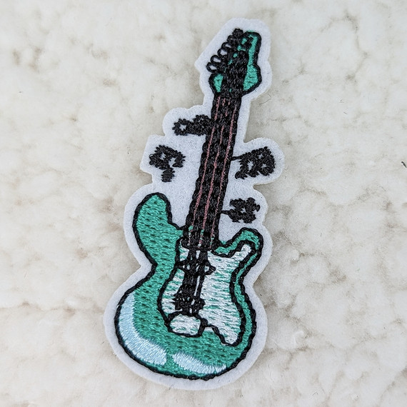 Guitar Embroidered HAT/POCKET Patch, detailed embroidered patch depicting an electric guitar with intricate stitching and color details.