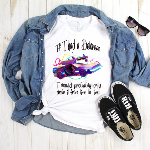 Product: Fan Art Sublimation Transfer T-Shirt, a white T-shirt with a colorful, futuristic DeLorean car graphic and humorous text about time travel.