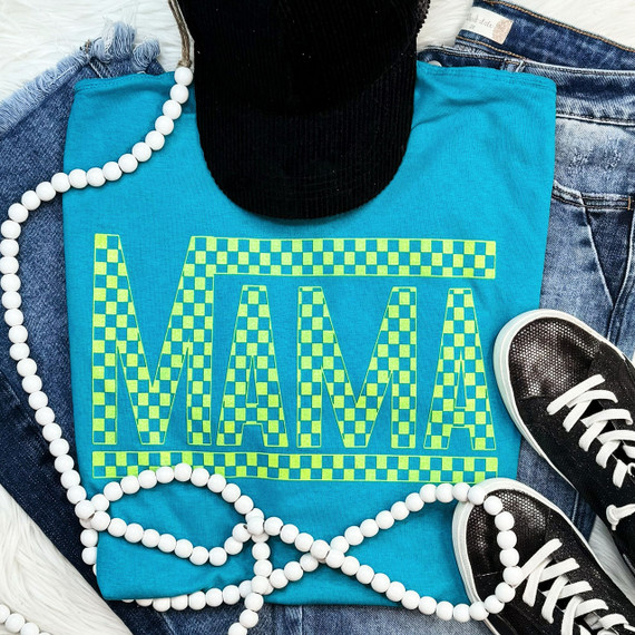 Mama Checkered NEON YELLOW Screen Print Heat Transfer, vibrant neon yellow checkered design on a blue T-shirt, with denim jeans and black sneakers in the background.