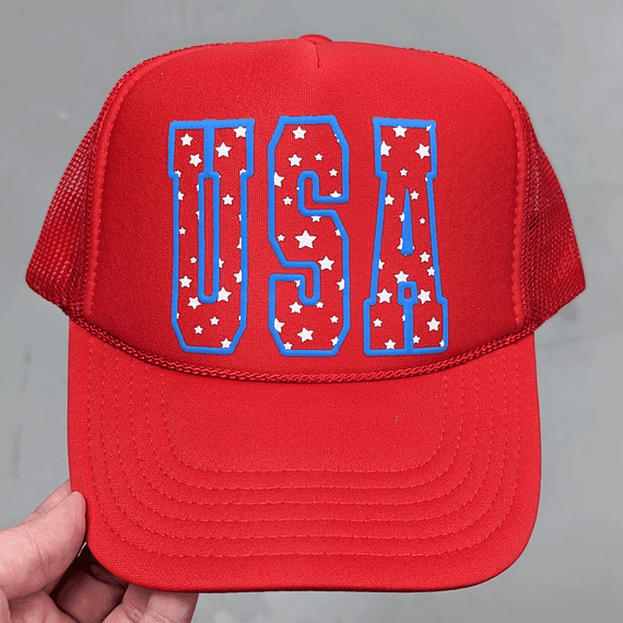 USA Blue PUFF Hat/Pocket Screen Print Heat Transfer, red trucker hat with blue outlined 'USA' lettering and white star patterns.