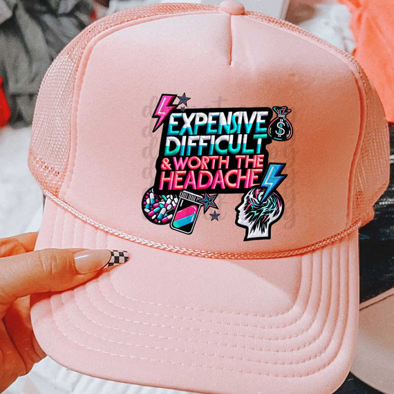 Expensive Difficult & Worth The Headache Faux Patch DTF Heat Transfer, pink trucker hat with colorful graphic design and text.
