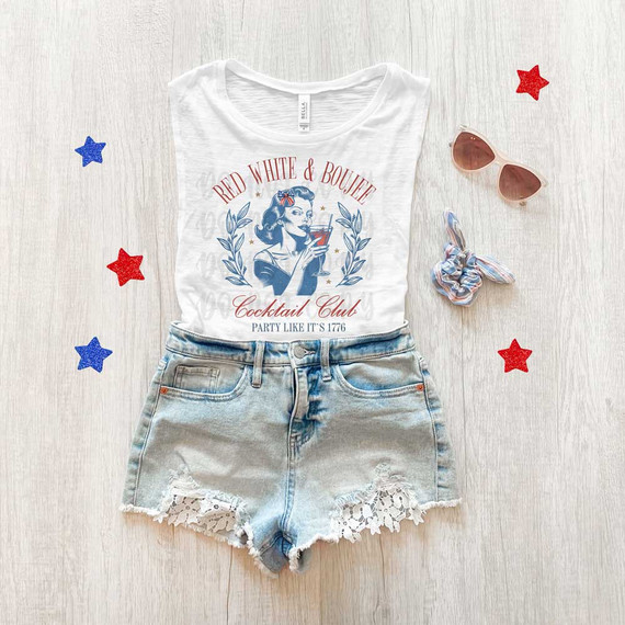 Red, White & Boujee Cocktail Club DTF Heat Transfer, image of a T-shirt with a vintage woman holding a cocktail glass, paired with denim shorts, sunglasses, and a scrunchie, with red and blue star decorations around.