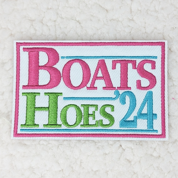BOATS Hoes '24 FRAMED Embroidered HAT/POCKET Patch, colorful embroidered patch with pink, green, and blue text and borders on a white background.