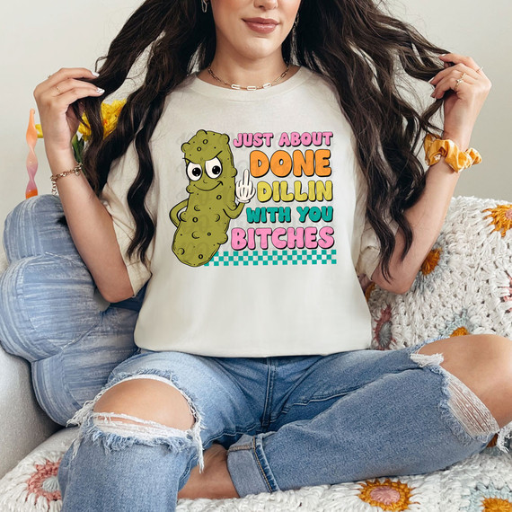 Just About Done Dillin With You Bitches Retro DTF Heat Transfer T-shirt worn by a woman showcasing a casual style.