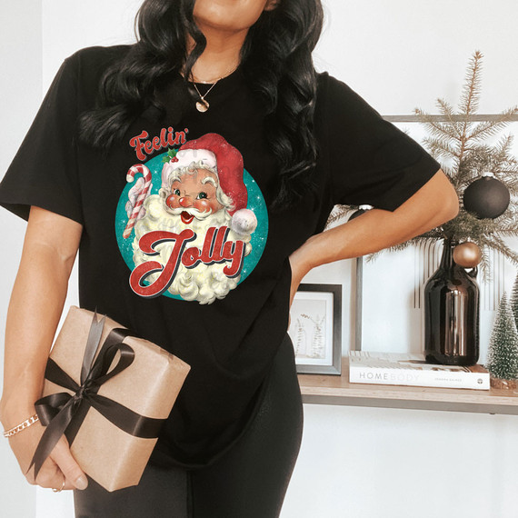 Feelin' Jolly Vintage Santa DTF Heat Transfer, festive Christmas themed T-shirt featuring a vintage Santa Claus design with holiday colors and elements.