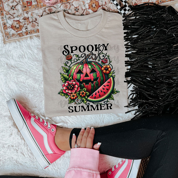 Spooky Girl Summer Watermelon DTF Heat Transfer, colorful graphic t-shirt with a carved watermelon pumpkin, flowers, and watermelon slices for summer.