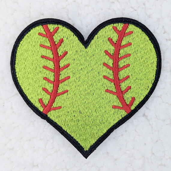 Softball Heart Embroidered HAT/POCKET Patch, green heart-shaped design with red baseball stitching on a light background.