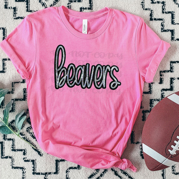 Beavers Faux Sequin Patch DTF Heat Transfer, pink graphic t-shirt with the word 'beavers' in black & silver faux sequin patch detailing.