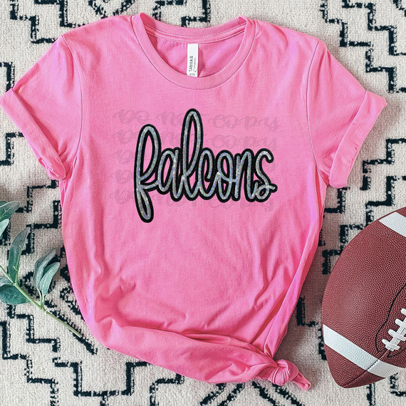 Falcons Faux Sequin Patch DTF Heat Transfer, pink T-shirt with a black and silver sequin embroidered Falcons logo.