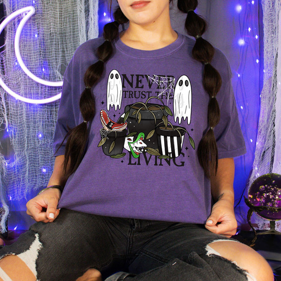 Never Trust DTF Heat Transfer, Halloween-themed graphic t-shirt with ghosts, spiderwebs, and cartoon monsters design.