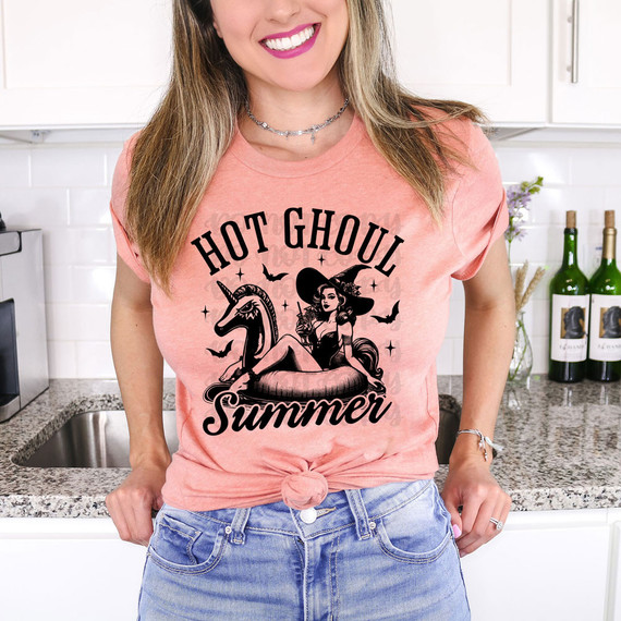 Hot Ghoul Summer DTF Heat Transfer, a design featuring a witch, unicorn, and bats with the text "Hot Ghoul Summer" on a woman's T-shirt.