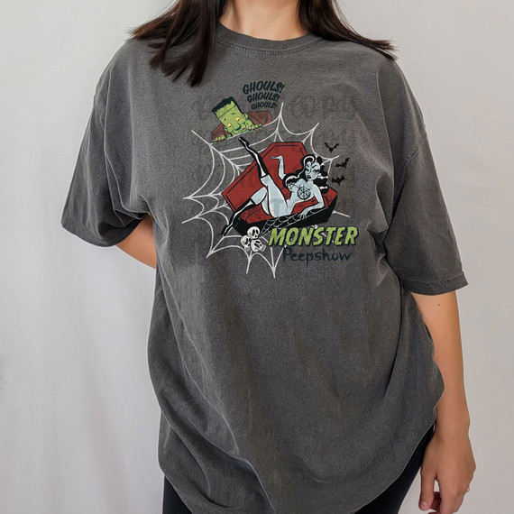 Monster Peepshow DTF Heat Transfer, Halloween-themed cartoon graphic featuring a vampire, ghouls, and bats on a dark grey T-shirt.