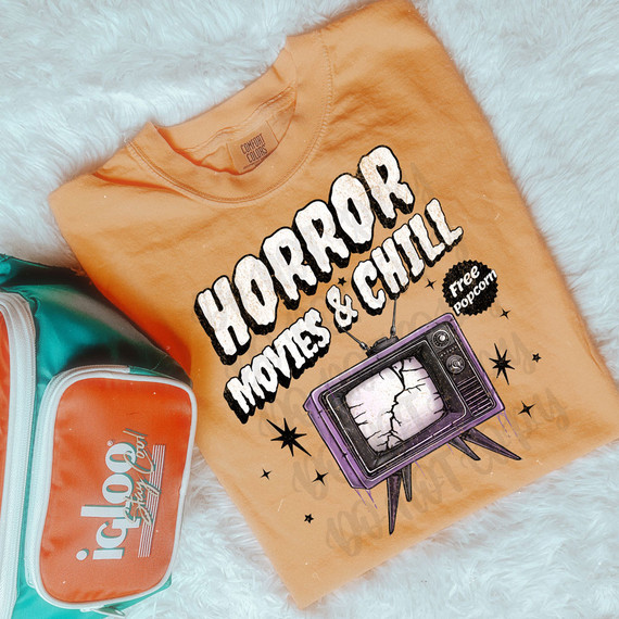 Horror Movies & Chill DTF Heat Transfer, orange T-shirt with vintage TV graphic and bold text design.