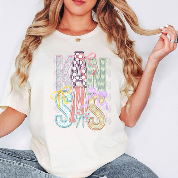 Kansas Coquette Faux Embroidery DTF Heat Transfer, pastel-colored embroidered lettering on a white T-shirt