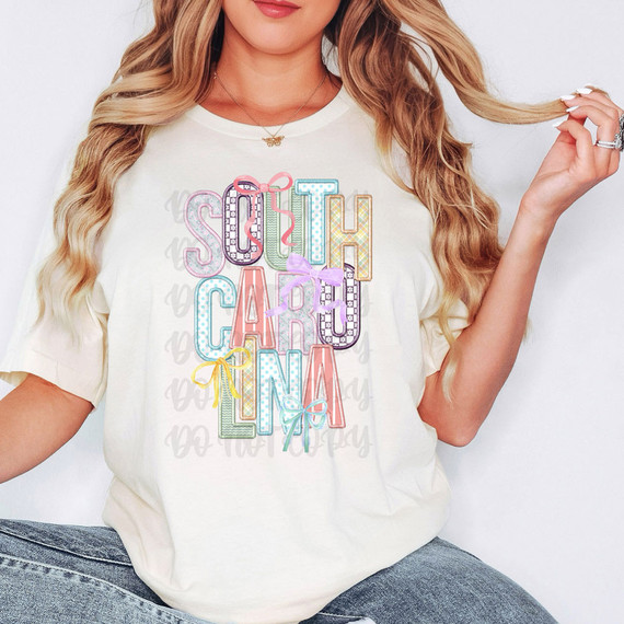 South Carolina Coquette Faux Embroidery DTF Heat Transfer, colorful pastel letter design on white T-shirt.